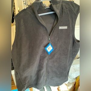 Columbia navy blue fleece vest .